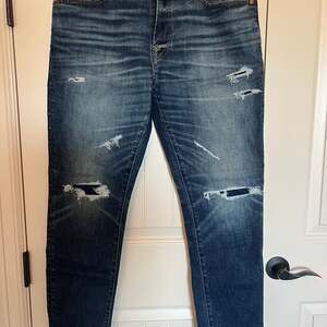 American Eagle AirFlex+ Temp Tech Patched Distressed Jeans 33x30
